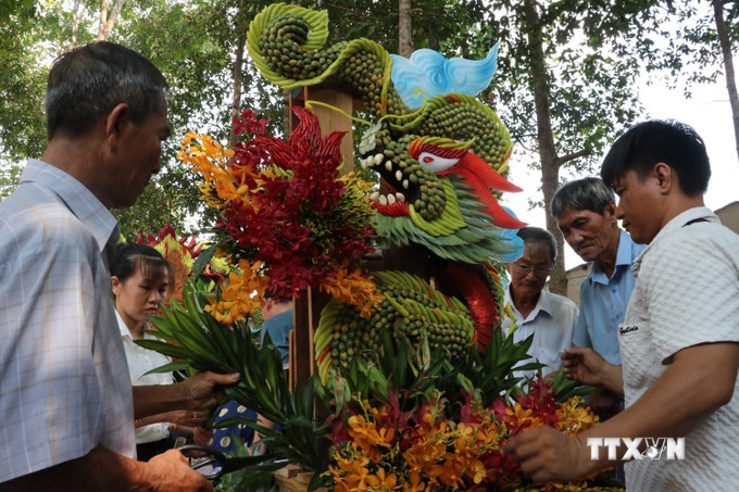 vna-potal-doc-dao-nghe-thuat-tao-hinh-hoa-qua-cua-nguoi-dan-tuong-binh-hiep-binh-duong-7353371-5699-1714722367.jpg